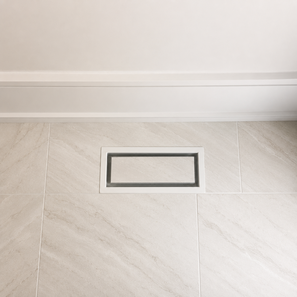 White 4x10 floor-matching vent cover installed in light tile floor