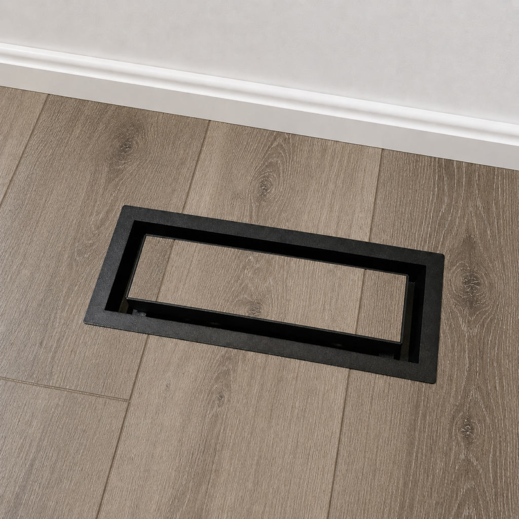Black floor-matching vent cover with a matching wood insert